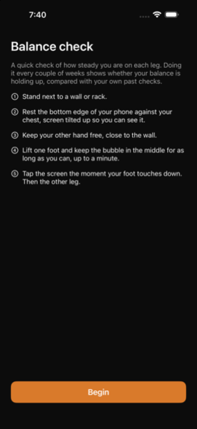 The balance check instructions: stand next to a wall, rest the bottom edge of the phone against your chest with the screen tilted up, keep your other hand free, lift one foot, and tap when your foot touches down.